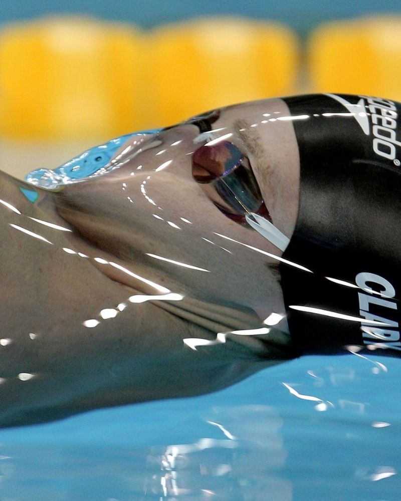 Surface tension on the water can make swimmers look a little terrifying